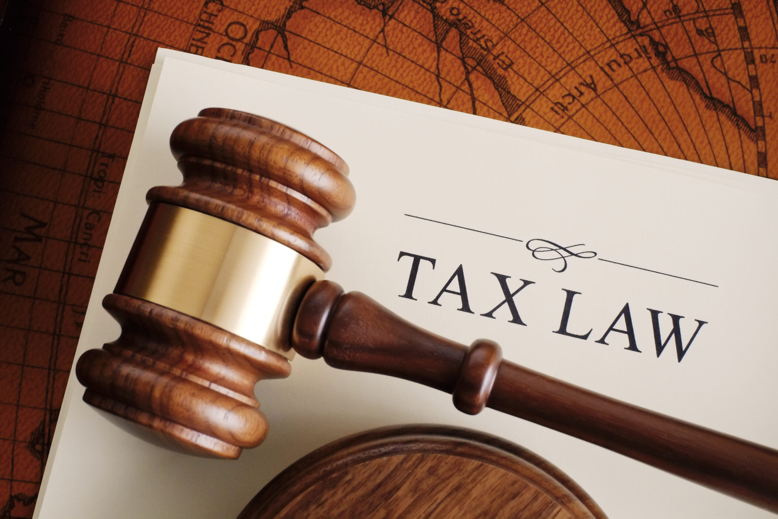 tax law document with a judge gavel